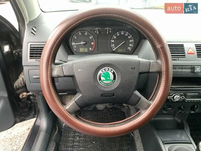 Черный Шкода Фабия, объемом двигателя 1.4 л и пробегом 308 тыс. км за 3390 $, фото 25 на Automoto.ua