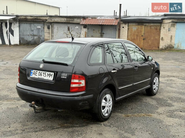 Черный Шкода Фабия, объемом двигателя 1.4 л и пробегом 233 тыс. км за 3800 $, фото 2 на Automoto.ua