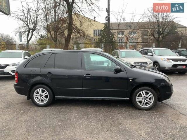Черный Шкода Фабия, объемом двигателя 1.4 л и пробегом 308 тыс. км за 3390 $, фото 3 на Automoto.ua