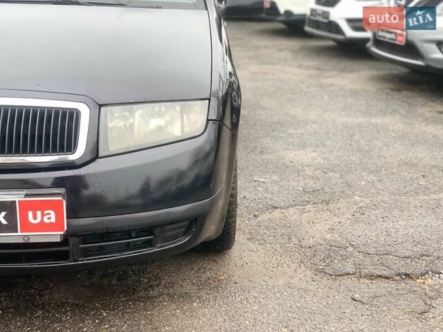 Черный Шкода Фабия, объемом двигателя 1.4 л и пробегом 308 тыс. км за 3390 $, фото 8 на Automoto.ua