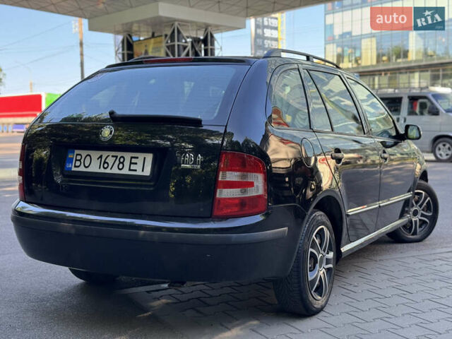 Черный Шкода Фабия, объемом двигателя 1.39 л и пробегом 255 тыс. км за 3750 $, фото 14 на Automoto.ua