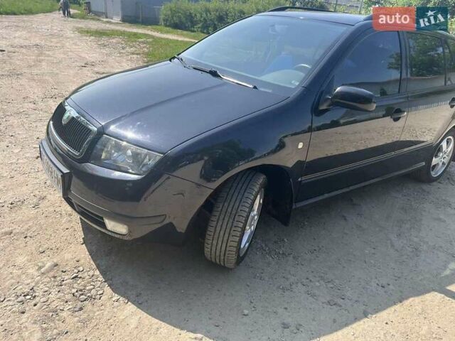 Черный Шкода Фабия, объемом двигателя 1.39 л и пробегом 226 тыс. км за 4600 $, фото 3 на Automoto.ua