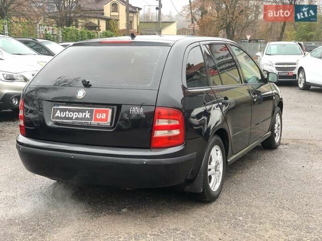 Черный Шкода Фабия, объемом двигателя 1.4 л и пробегом 308 тыс. км за 3390 $, фото 4 на Automoto.ua