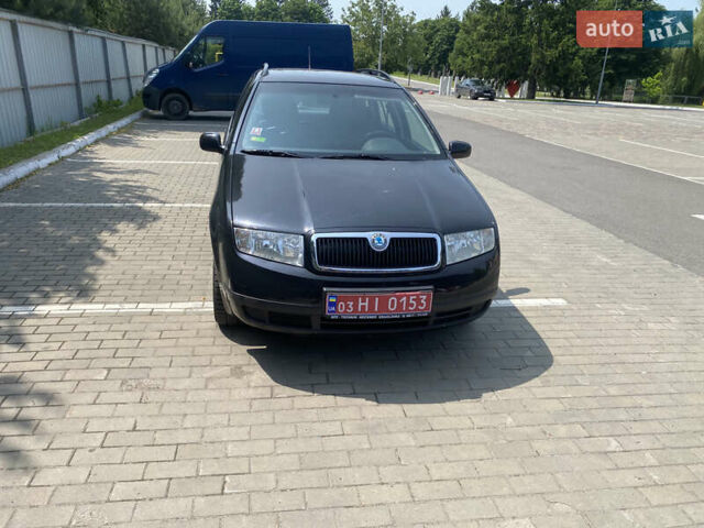 Черный Шкода Фабия, объемом двигателя 1.4 л и пробегом 219 тыс. км за 3750 $, фото 5 на Automoto.ua