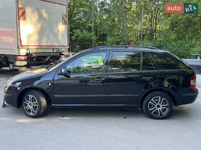 Черный Шкода Фабия, объемом двигателя 1.39 л и пробегом 255 тыс. км за 3750 $, фото 4 на Automoto.ua