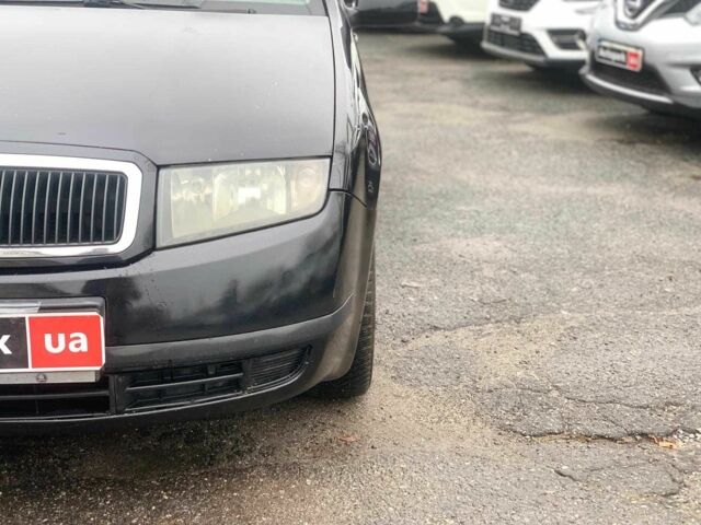 Черный Шкода Фабия, объемом двигателя 1.4 л и пробегом 308 тыс. км за 3390 $, фото 8 на Automoto.ua