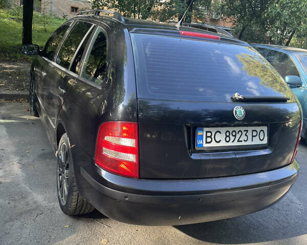 Черный Шкода Фабия, объемом двигателя 1.9 л и пробегом 350 тыс. км за 5700 $, фото 2 на Automoto.ua