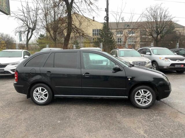 Черный Шкода Фабия, объемом двигателя 1.4 л и пробегом 308 тыс. км за 3390 $, фото 3 на Automoto.ua