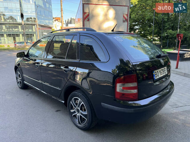 Черный Шкода Фабия, объемом двигателя 1.39 л и пробегом 255 тыс. км за 3750 $, фото 7 на Automoto.ua