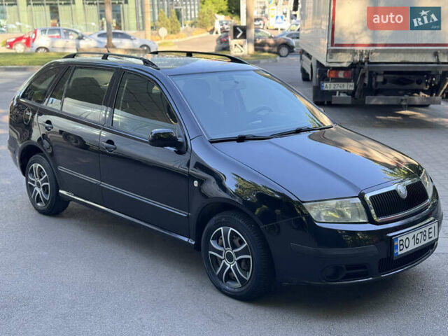 Черный Шкода Фабия, объемом двигателя 1.39 л и пробегом 255 тыс. км за 3750 $, фото 11 на Automoto.ua