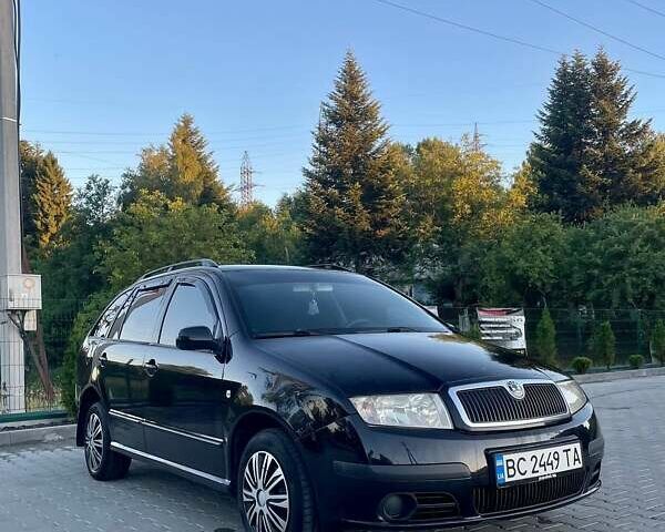 Черный Шкода Фабия, объемом двигателя 1.42 л и пробегом 275 тыс. км за 3800 $, фото 1 на Automoto.ua