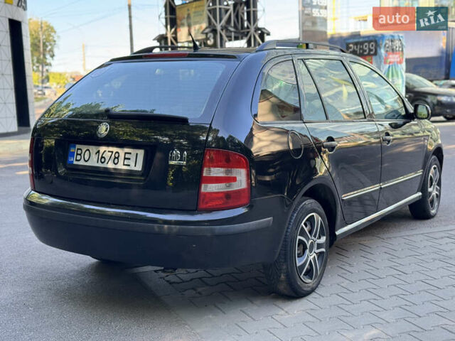 Черный Шкода Фабия, объемом двигателя 1.39 л и пробегом 255 тыс. км за 3750 $, фото 6 на Automoto.ua