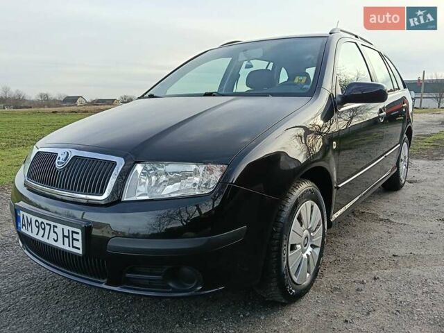 Черный Шкода Фабия, объемом двигателя 1.4 л и пробегом 225 тыс. км за 4800 $, фото 7 на Automoto.ua
