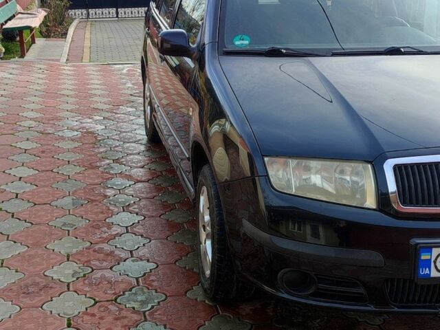 Черный Шкода Фабия, объемом двигателя 1.4 л и пробегом 367 тыс. км за 3500 $, фото 4 на Automoto.ua