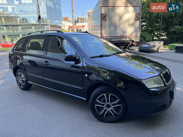 Черный Шкода Фабия, объемом двигателя 1.39 л и пробегом 255 тыс. км за 3750 $, фото 8 на Automoto.ua