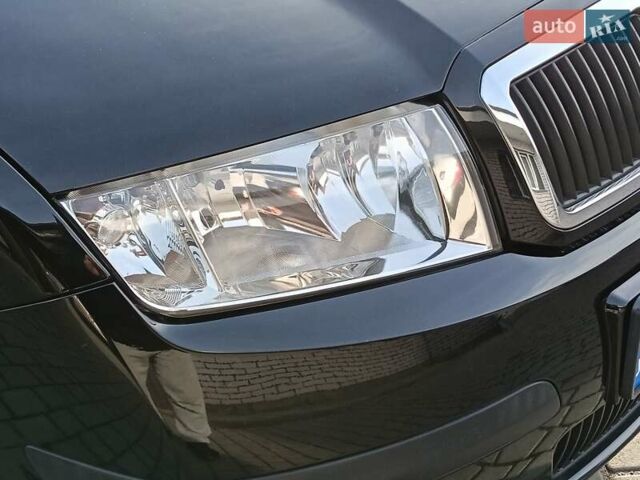 Черный Шкода Фабия, объемом двигателя 1.4 л и пробегом 225 тыс. км за 4800 $, фото 21 на Automoto.ua