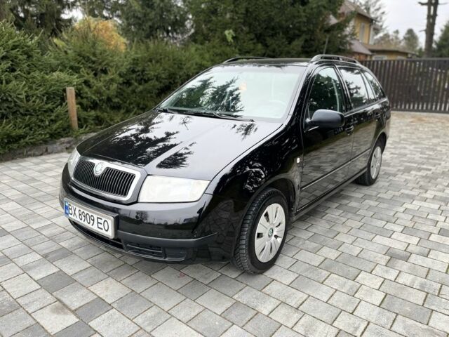 Черный Шкода Фабия, объемом двигателя 1.4 л и пробегом 230 тыс. км за 3999 $, фото 1 на Automoto.ua