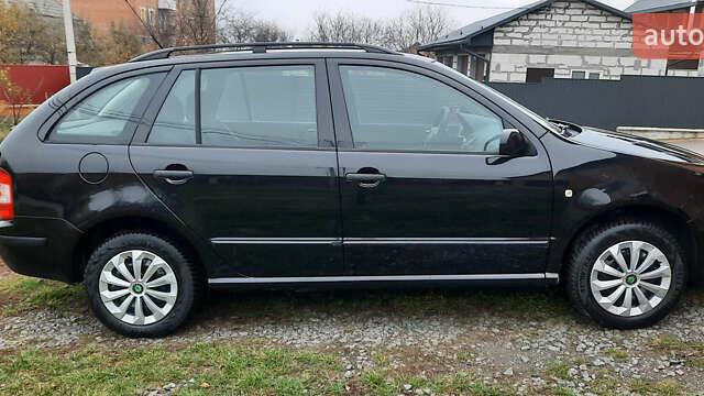 Черный Шкода Фабия, объемом двигателя 1.39 л и пробегом 168 тыс. км за 4600 $, фото 16 на Automoto.ua