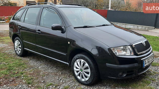 Черный Шкода Фабия, объемом двигателя 1.39 л и пробегом 168 тыс. км за 4600 $, фото 3 на Automoto.ua