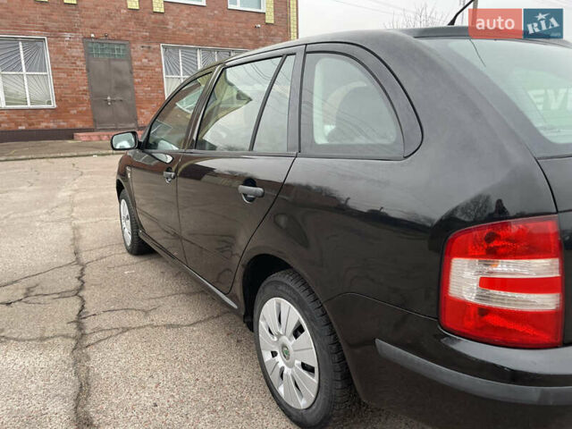 Черный Шкода Фабия, объемом двигателя 1.2 л и пробегом 245 тыс. км за 3450 $, фото 20 на Automoto.ua