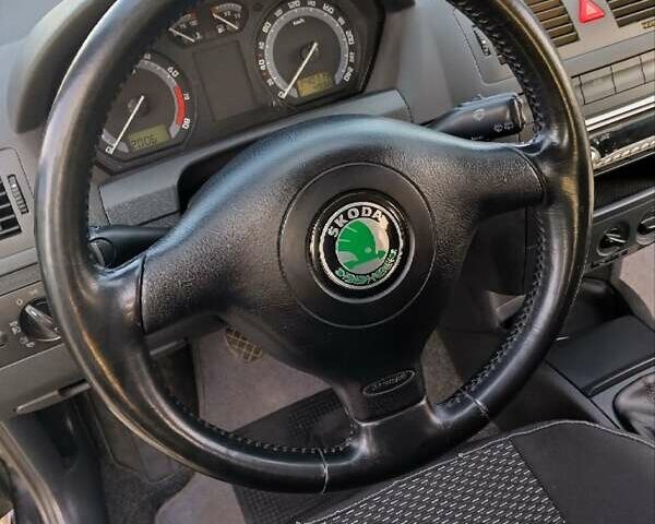 Черный Шкода Фабия, объемом двигателя 1.39 л и пробегом 240 тыс. км за 5000 $, фото 15 на Automoto.ua