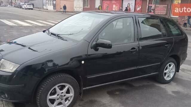 Черный Шкода Фабия, объемом двигателя 1.4 л и пробегом 293 тыс. км за 3850 $, фото 3 на Automoto.ua