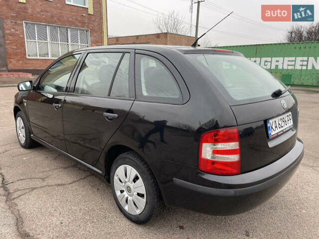 Черный Шкода Фабия, объемом двигателя 1.2 л и пробегом 245 тыс. км за 3450 $, фото 13 на Automoto.ua