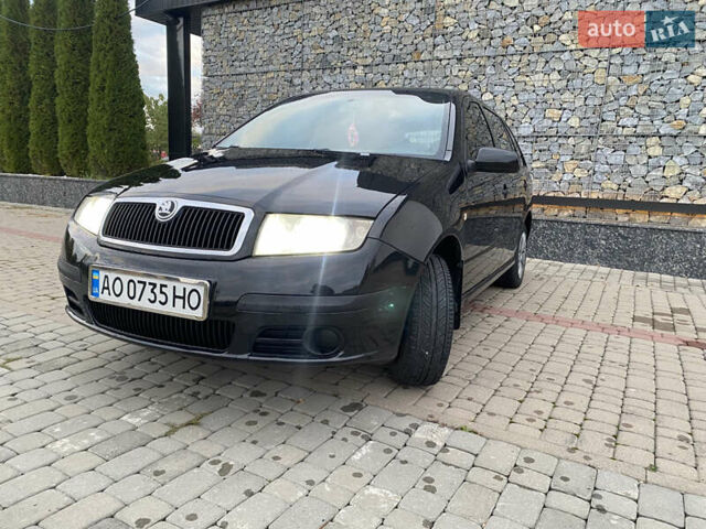 Черный Шкода Фабия, объемом двигателя 1.2 л и пробегом 205 тыс. км за 3200 $, фото 8 на Automoto.ua