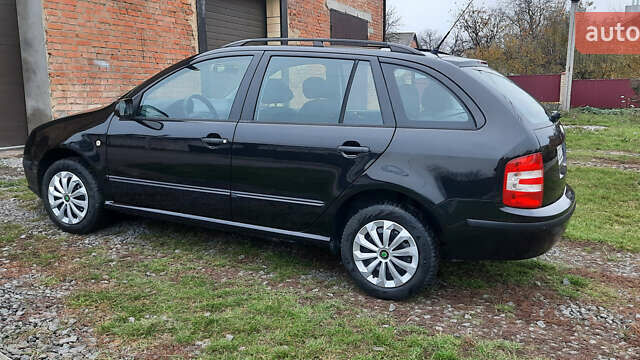 Черный Шкода Фабия, объемом двигателя 1.39 л и пробегом 168 тыс. км за 4600 $, фото 13 на Automoto.ua