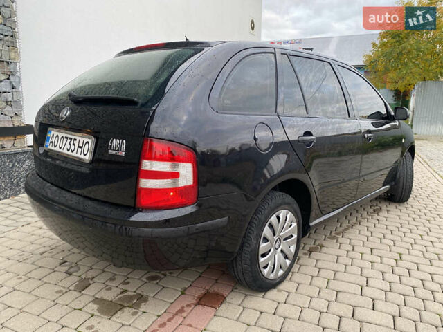 Черный Шкода Фабия, объемом двигателя 1.2 л и пробегом 205 тыс. км за 3200 $, фото 5 на Automoto.ua