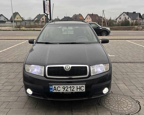Черный Шкода Фабия, объемом двигателя 1.42 л и пробегом 262 тыс. км за 4200 $, фото 7 на Automoto.ua