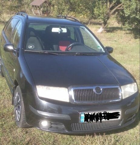 Черный Шкода Фабия, объемом двигателя 1.4 л и пробегом 208 тыс. км за 4000 $, фото 3 на Automoto.ua
