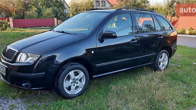 Черный Шкода Фабия, объемом двигателя 1.39 л и пробегом 167 тыс. км за 4750 $, фото 8 на Automoto.ua
