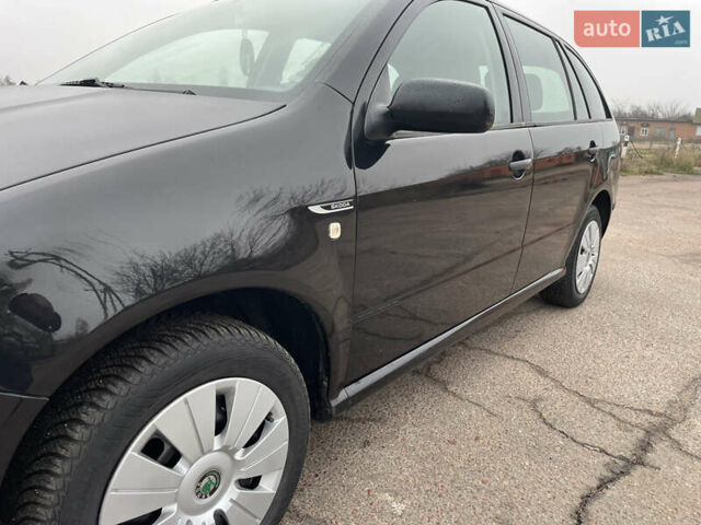 Черный Шкода Фабия, объемом двигателя 1.2 л и пробегом 245 тыс. км за 3450 $, фото 12 на Automoto.ua