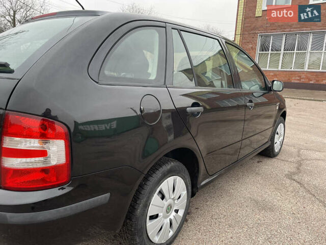 Черный Шкода Фабия, объемом двигателя 1.2 л и пробегом 245 тыс. км за 3450 $, фото 19 на Automoto.ua