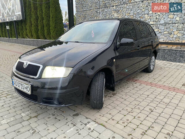 Черный Шкода Фабия, объемом двигателя 1.2 л и пробегом 205 тыс. км за 3200 $, фото 7 на Automoto.ua