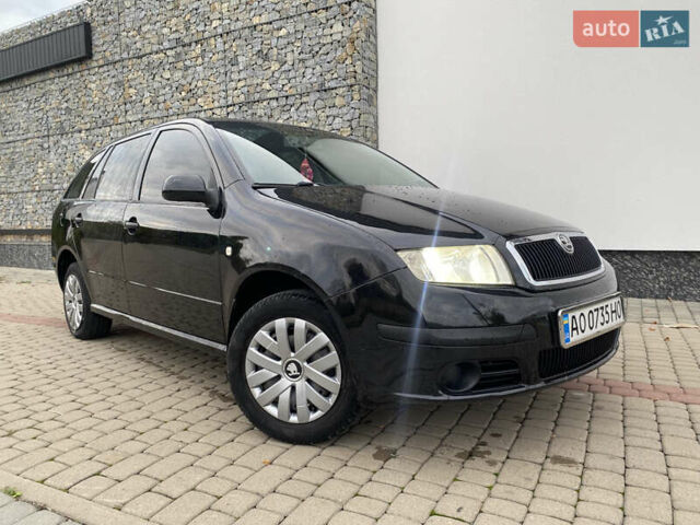Черный Шкода Фабия, объемом двигателя 1.2 л и пробегом 205 тыс. км за 3200 $, фото 10 на Automoto.ua