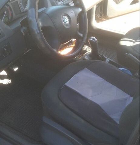 Черный Шкода Фабия, объемом двигателя 1.4 л и пробегом 208 тыс. км за 4000 $, фото 4 на Automoto.ua