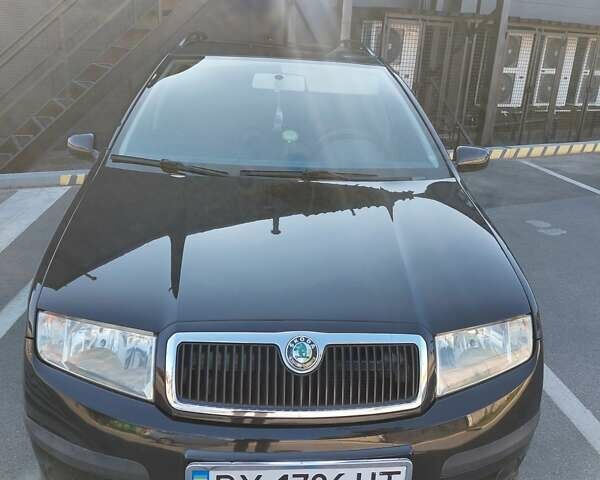 Черный Шкода Фабия, объемом двигателя 1.39 л и пробегом 240 тыс. км за 5300 $, фото 6 на Automoto.ua