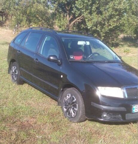 Черный Шкода Фабия, объемом двигателя 1.4 л и пробегом 208 тыс. км за 4000 $, фото 2 на Automoto.ua