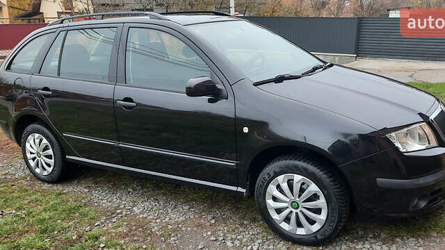 Черный Шкода Фабия, объемом двигателя 1.39 л и пробегом 168 тыс. км за 4600 $, фото 10 на Automoto.ua