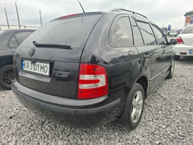 Черный Шкода Фабия, объемом двигателя 1.4 л и пробегом 229 тыс. км за 4350 $, фото 2 на Automoto.ua