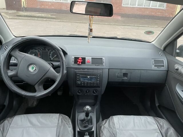 Чорний Шкода Фабія, об'ємом двигуна 1.2 л та пробігом 225 тис. км за 3450 $, фото 16 на Automoto.ua