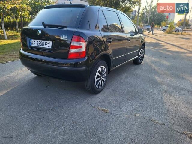 Черный Шкода Фабия, объемом двигателя 1.2 л и пробегом 212 тыс. км за 3700 $, фото 7 на Automoto.ua