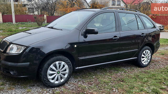 Черный Шкода Фабия, объемом двигателя 1.39 л и пробегом 168 тыс. км за 4600 $, фото 6 на Automoto.ua