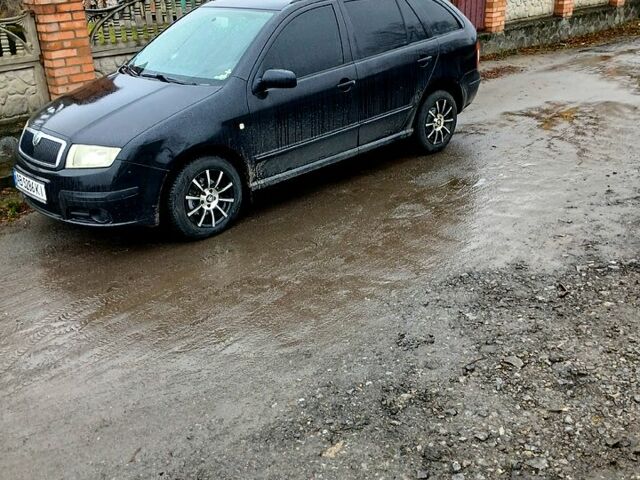 Черный Шкода Фабия, объемом двигателя 1.4 л и пробегом 247 тыс. км за 6000 $, фото 1 на Automoto.ua
