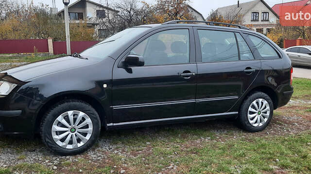 Черный Шкода Фабия, объемом двигателя 1.39 л и пробегом 168 тыс. км за 4600 $, фото 11 на Automoto.ua
