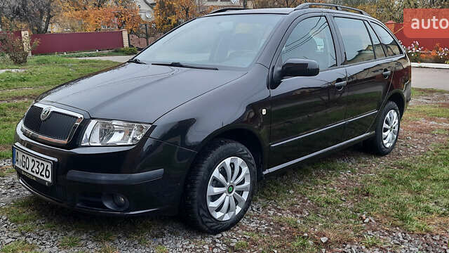 Черный Шкода Фабия, объемом двигателя 1.39 л и пробегом 168 тыс. км за 4600 $, фото 4 на Automoto.ua