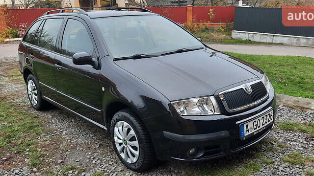 Черный Шкода Фабия, объемом двигателя 1.39 л и пробегом 168 тыс. км за 4600 $, фото 7 на Automoto.ua
