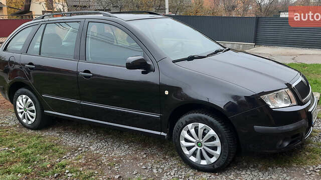 Черный Шкода Фабия, объемом двигателя 1.39 л и пробегом 168 тыс. км за 4600 $, фото 9 на Automoto.ua